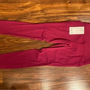 New Athleta Salutation Stash Magenta Leggings side pocket white accents